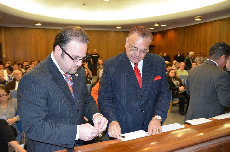 Councilman Jack Hadjinian swearing in George B. Pacheco as the City of Montebello Commissioner of Financial Investment